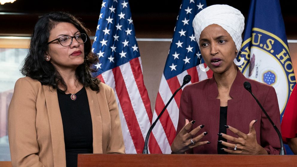 PHOTO: Rep. Ilhan Omar, right, speaks, as Rep. Rashida Tlaib listens, during a news conference at the Capitol in Washington, July 15, 2019.