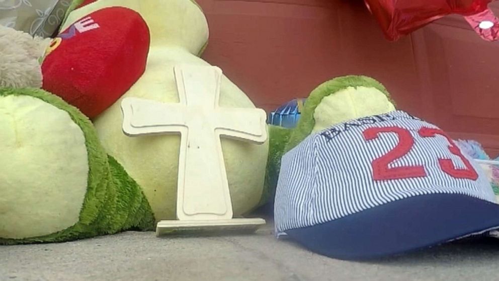 PHOTO: Stuffed animals and a baseball cap sit in a makeshift memorial near the scene of a shooting in Spring, Texas, that happened on July 2, 2019.
