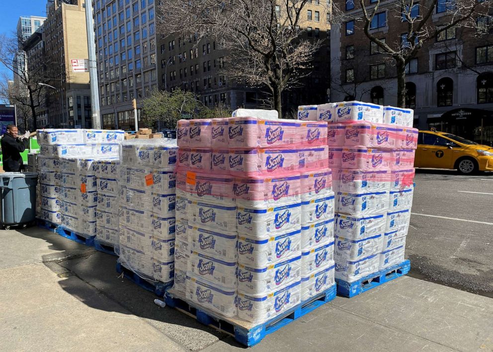 PHOTO: Pallets of toilet paper fill the sidewalk in front of grocer Fairway in Manhattan after panicky shoppers depleted shelves, amid fears of the global growth of coronavirus cases, in Manhattan, New York, March 15, 2020.