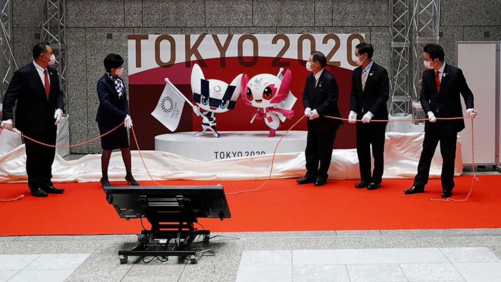 PHOTO: The statues of the official mascots for the Tokyo 2020 Olympics and Paralympics are unveiled, marking 100 days before the start of the Olympic Games, at the Tokyo Metropolitan Government building in Tokyo, April 14, 2021.