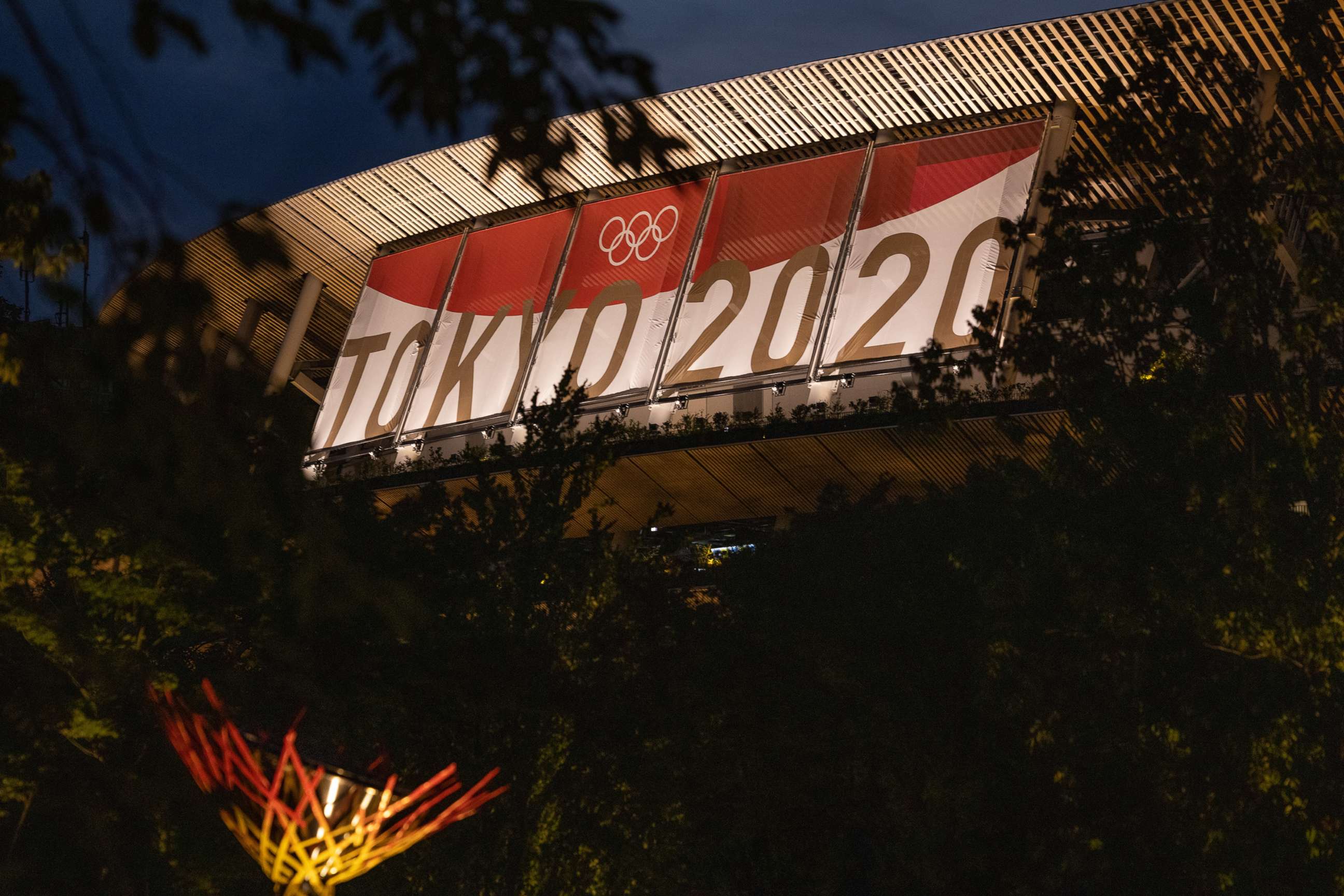 PHOTO: Olympic branding is displayed on Tokyo Olympic stadium on July 21, 2021, in Tokyo.