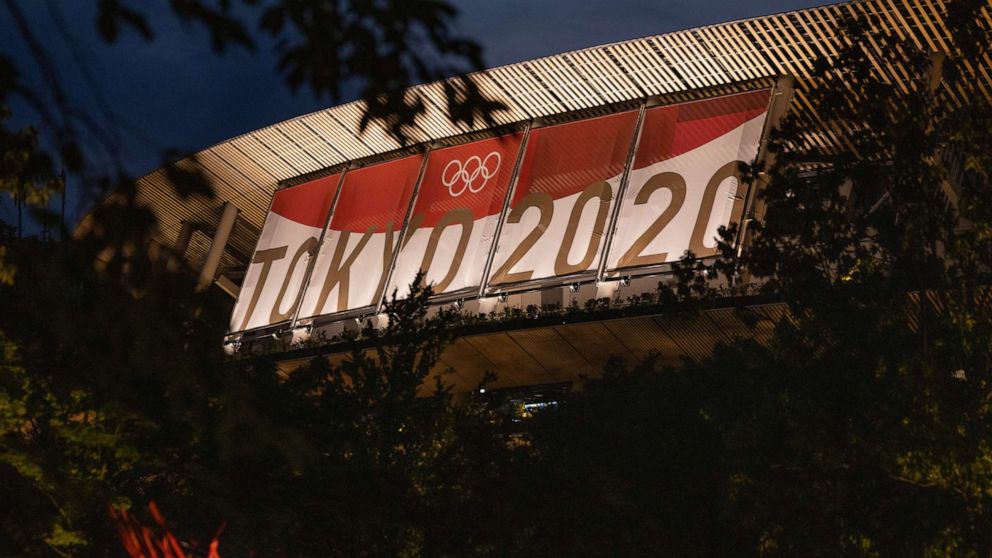 PHOTO: Olympic branding is displayed on Tokyo Olympic stadium on July 21, 2021, in Tokyo.