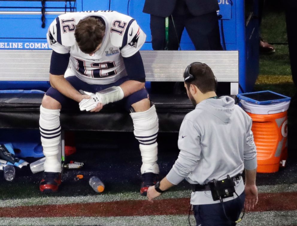 PHOTO: New England Patriots quarterback Tom Brady sits on the bench after fumbling against the Philadelphia Eagles during the second half of the NFL Super Bowl 52 football game on Feb. 4, 2018, in Minneapolis.