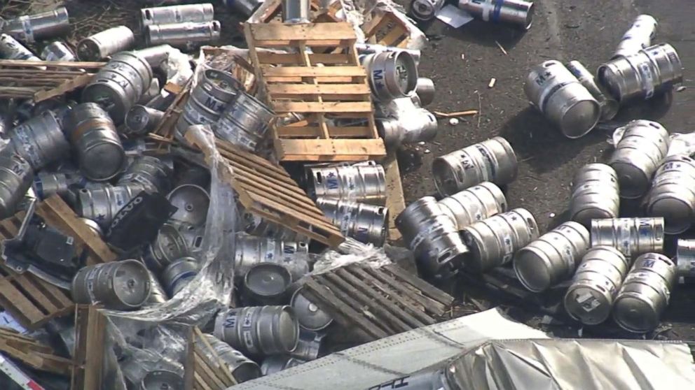 PHOTO: Hundreds of empty beer kegs and containers littered I-95 in Bensalem, Bucks County, PA, April 10, 2018, after a trucked plunged more than 20 ft.