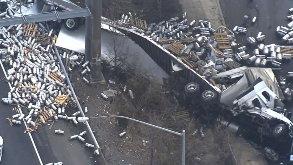 PHOTO: Hundreds of empty beer kegs and containers littered I-95 in Bensalem, Bucks County, PA, April 10, 2018, after a trucked plunged more than 20 ft.