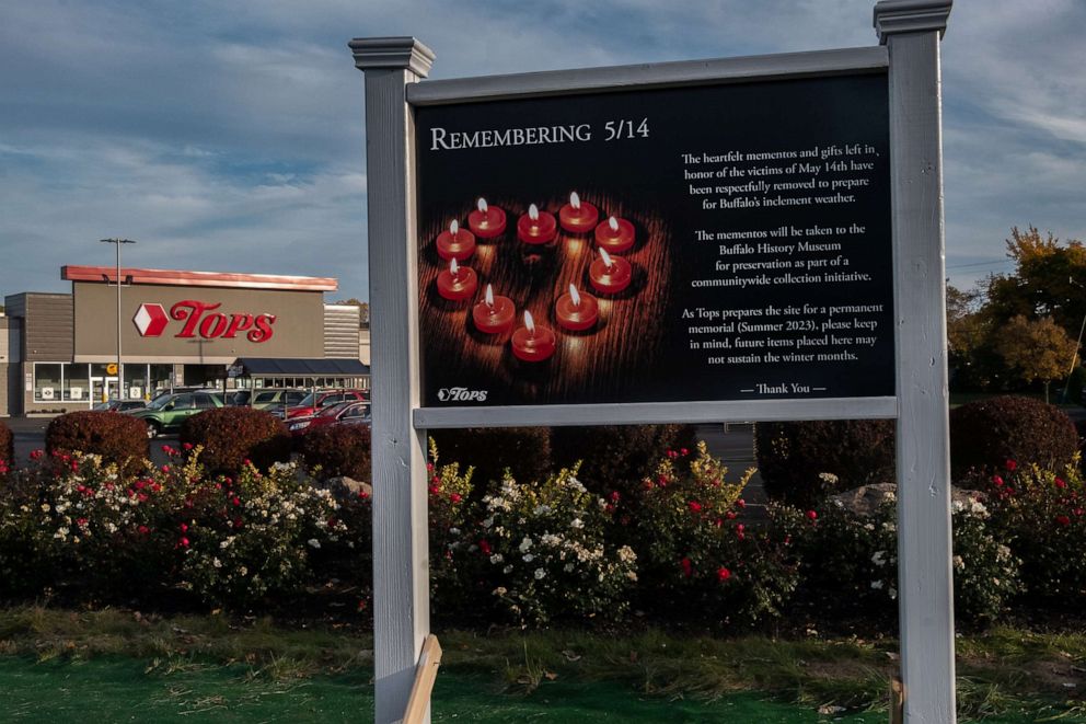 PHOTO: A sign commemorating the victims of a mass shooting at the Tops market on May 14, 2022 stands outside the store, Oct. 23, 2022, in Buffalo.