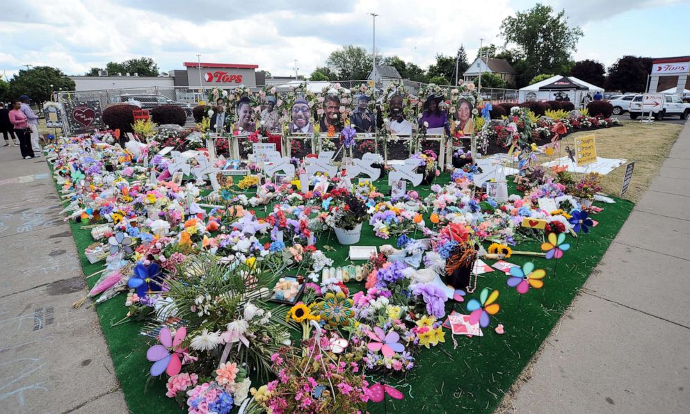 PHOTO: A makeshift memorial filled with flowers, photos and mementos outside the Tops Friendly Market, July 14, 2022, in Buffalo, N.Y.