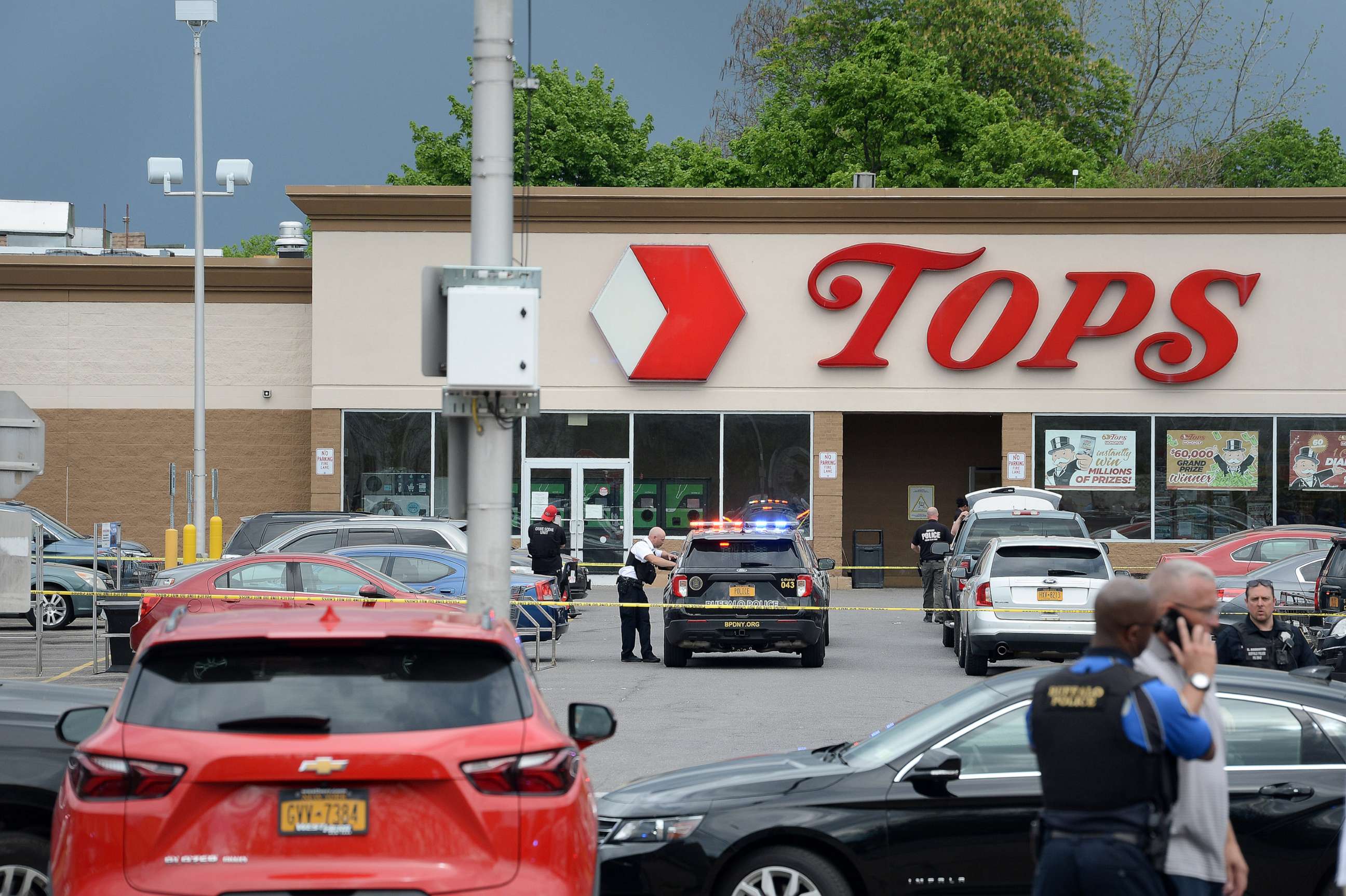 PHOTO: Buffalo police at the scene at Tops Friendly Market on May 14, 2022 in Buffalo, N.Y., after a mass shooting.
