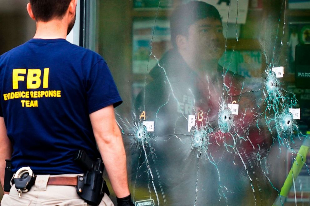 PHOTO: Investigators work the scene of a mass shooting at Tops supermarket in Buffalo, N.Y., Monday, May 16, 2022.