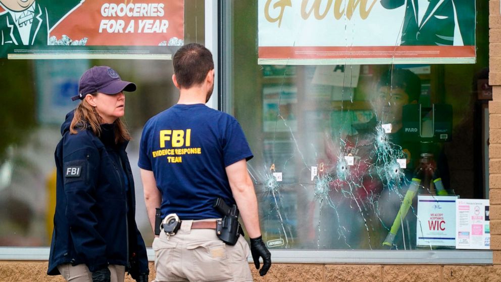 PHOTO: Investigators work the scene of a mass shooting at Tops supermarket in Buffalo, N.Y., Monday, May 16, 2022.