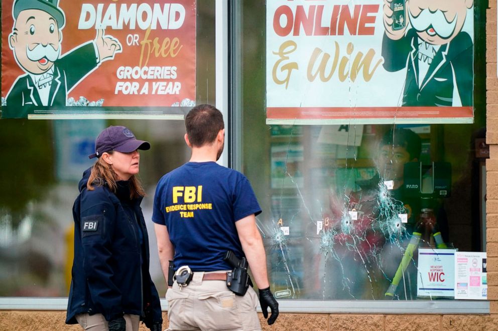 PHOTO: Investigators work the scene of a mass shooting at Tops supermarket in Buffalo, N.Y., Monday, May 16, 2022.