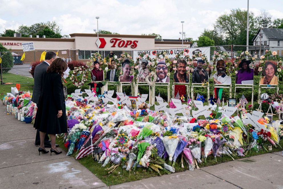 PHOTO: Vice President Kamala Harris and Second Gentleman Doug Emhoff pay their respects at a memorial at Tops Friendly Market, which was the site of a mass shooting in Buffalo, N.Y., May 28, 2022.