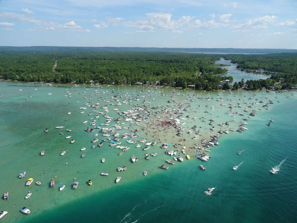 PHOTO: Several people tested positive for COVID-19 after attending Torch Fest at the Torch Lake sandbar near Rapid City, Mich., on July 4, 2020.