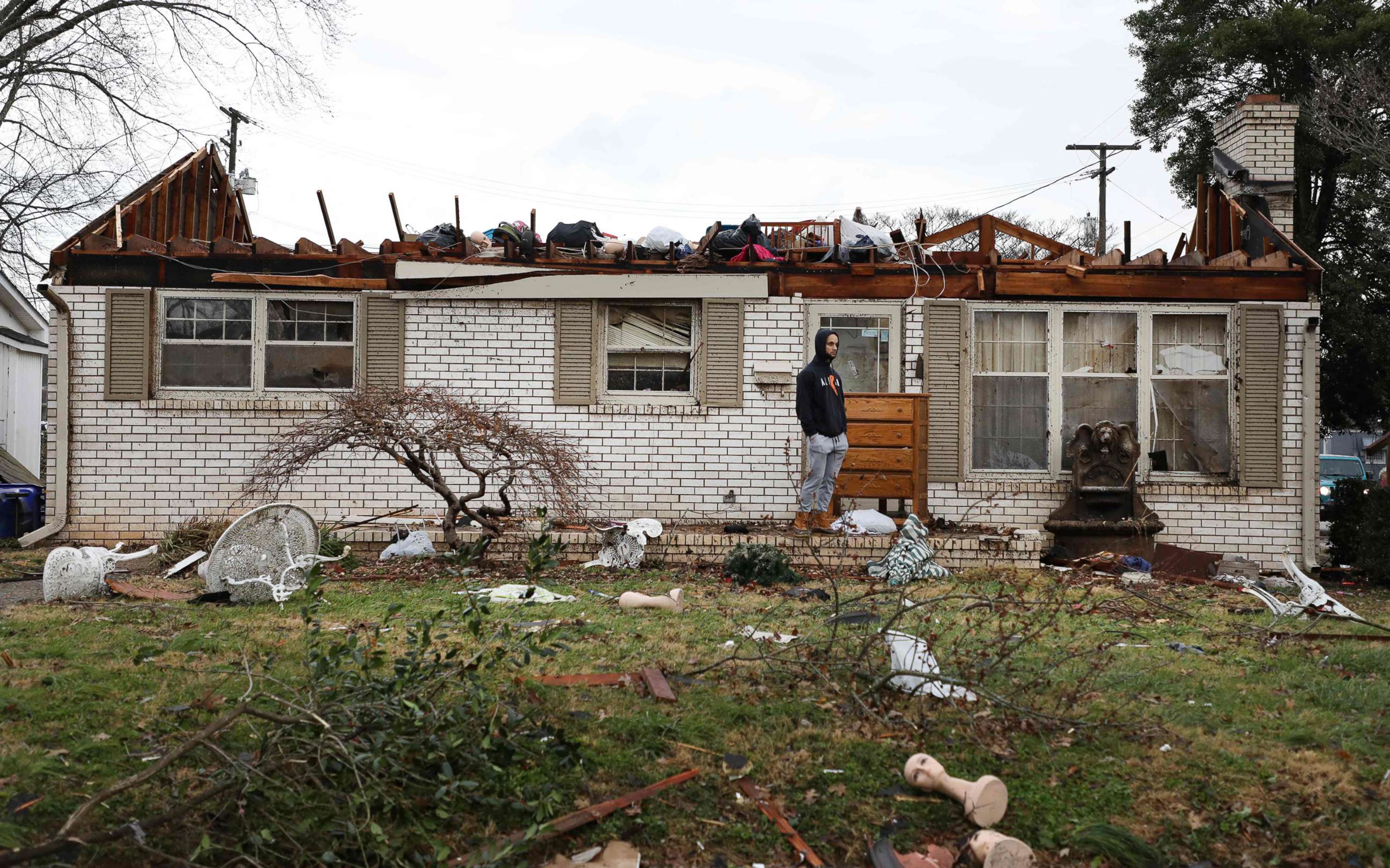 PHOTO: A person surveys the damage following a tornado that struck Bowling Green, Ky., Dec. 11, 2021.