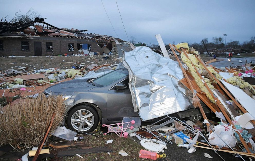 PHOTO: Debris covers a car near after a tornado touched down in Nashville, Tenn., March 3, 2020. 