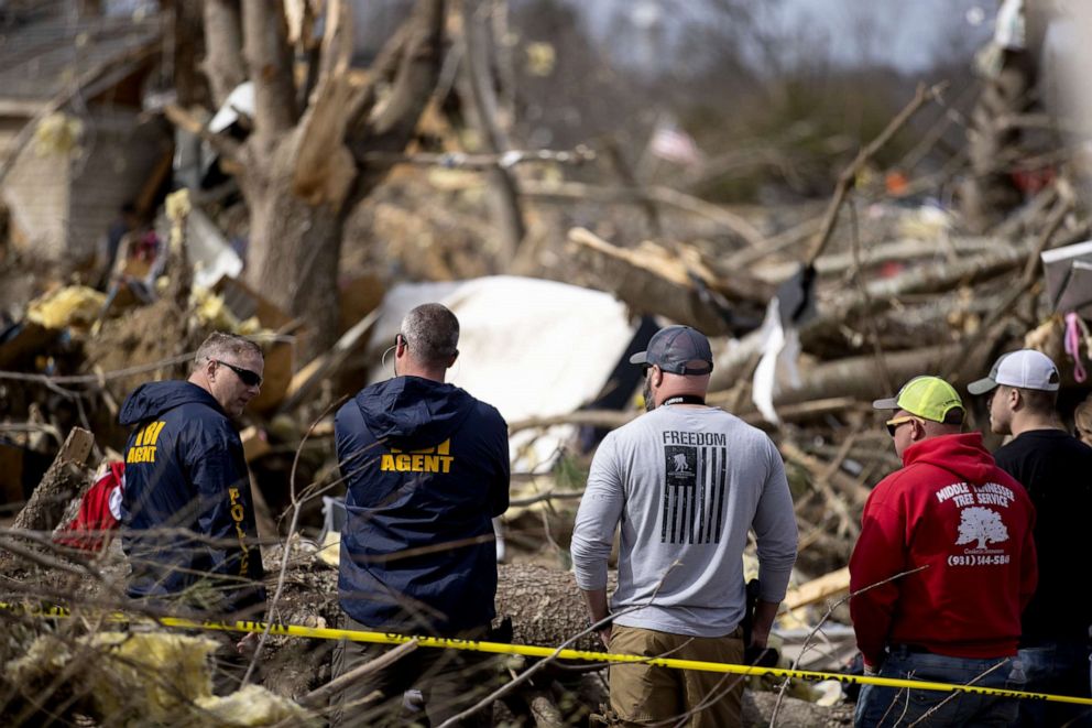 PHOTO: Tennessee Bureau of Investigation agents work in the wreckage of a home destroyed by tornado, March 4, 2020, in Cookeville, Tennessee.