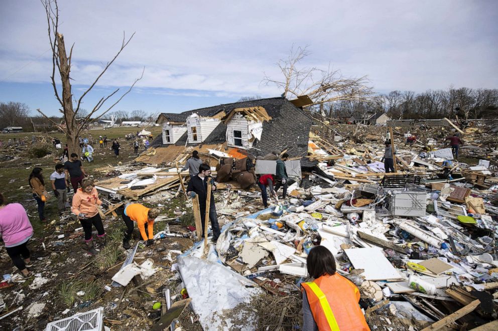 PHOTO: Volunteers work to clean up tornado-damaged areas, March 4, 2020, in Cookeville, Tennessee. 