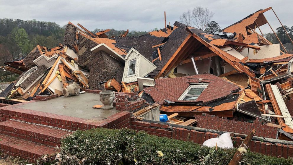PHOTO: Damage is seen to a home after a tornado passed through the Eagle Point subdivision, Thursday, March 25, 2021, near Birmingham, Ala.