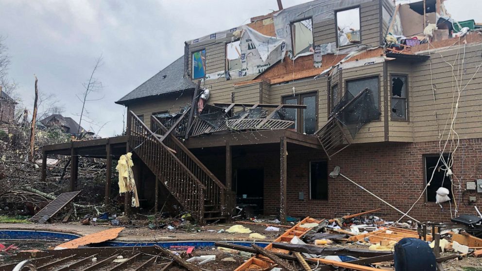 PHOTO: Damage is seen to a home after a tornado passed through the Eagle Point subdivision, Thursday, March 25, 2021, near Birmingham, Ala.