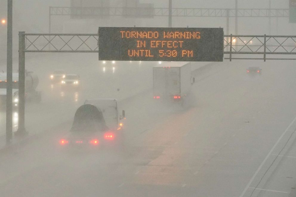 PHOTO: The Mississippi Department of Transportation digital message board warns drivers along I-55 southbound in Jackson of a tornado warning during a rainstorm during the outbreak of severe weather in the state, March 30, 2022. 