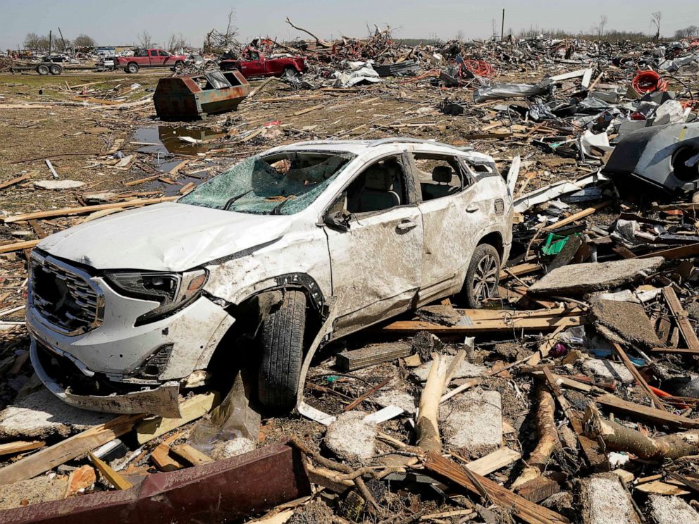 PHOTO: A vehicle destroyed by a tornado sits in a pile of rubble, Mar. 25, 2023, in Rolling Fork, Miss.