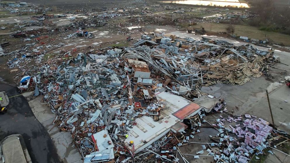 A deadly tornado and strong thunderstorms swept across Mississippi and Alabama late Friday, leaving at least 25 people dead.