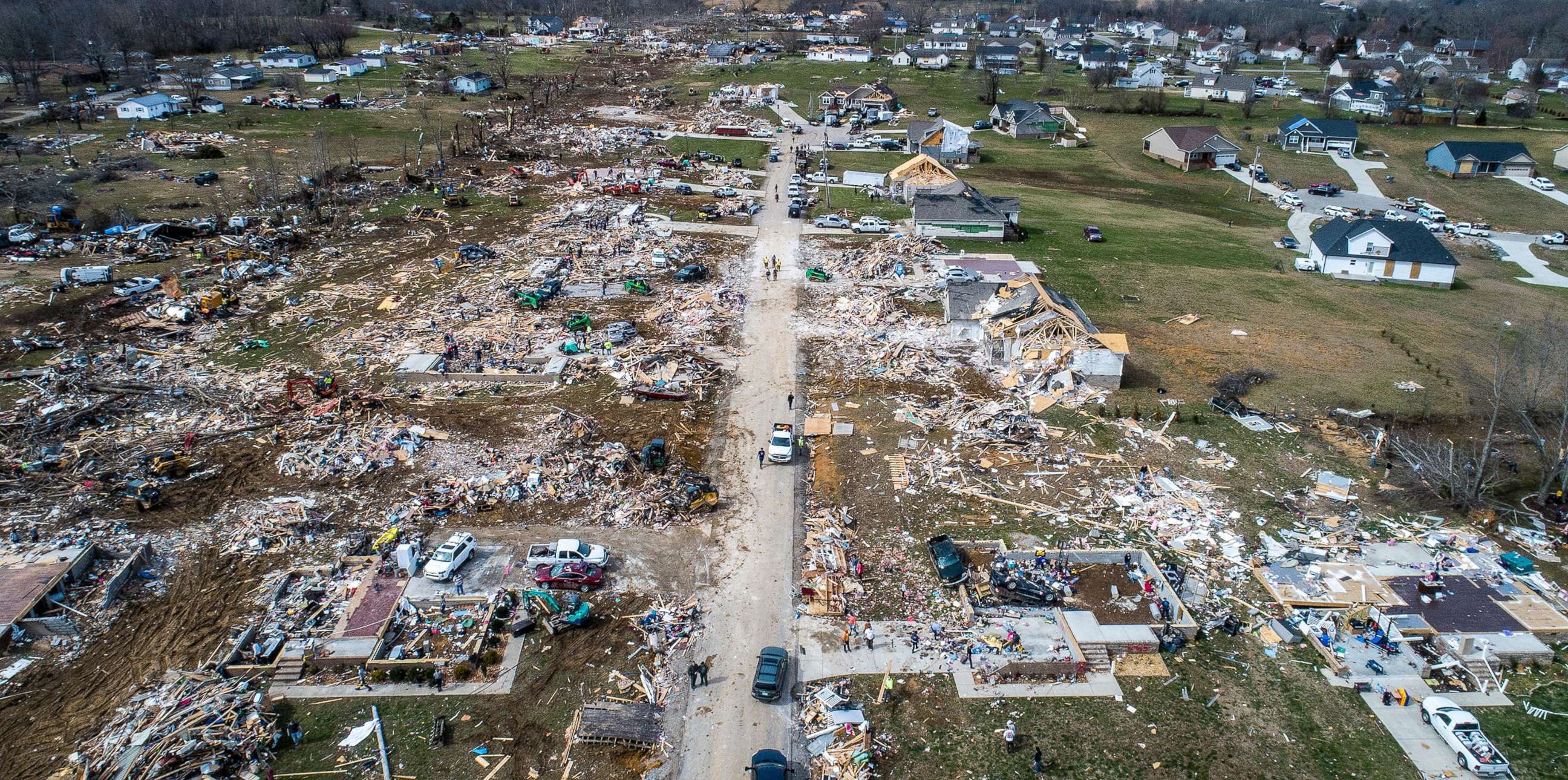 PHOTO: Residents view the damage on March 5, 2020, after multiple homes were completely wiped out by a tornado in a subdivision west of Cookeville, Tenn.