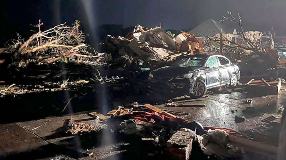 PHOTO: A damaged vehicle sits among debris after a deadly tornado tore through Brunswick County, N.C., Feb. 16, 2021.