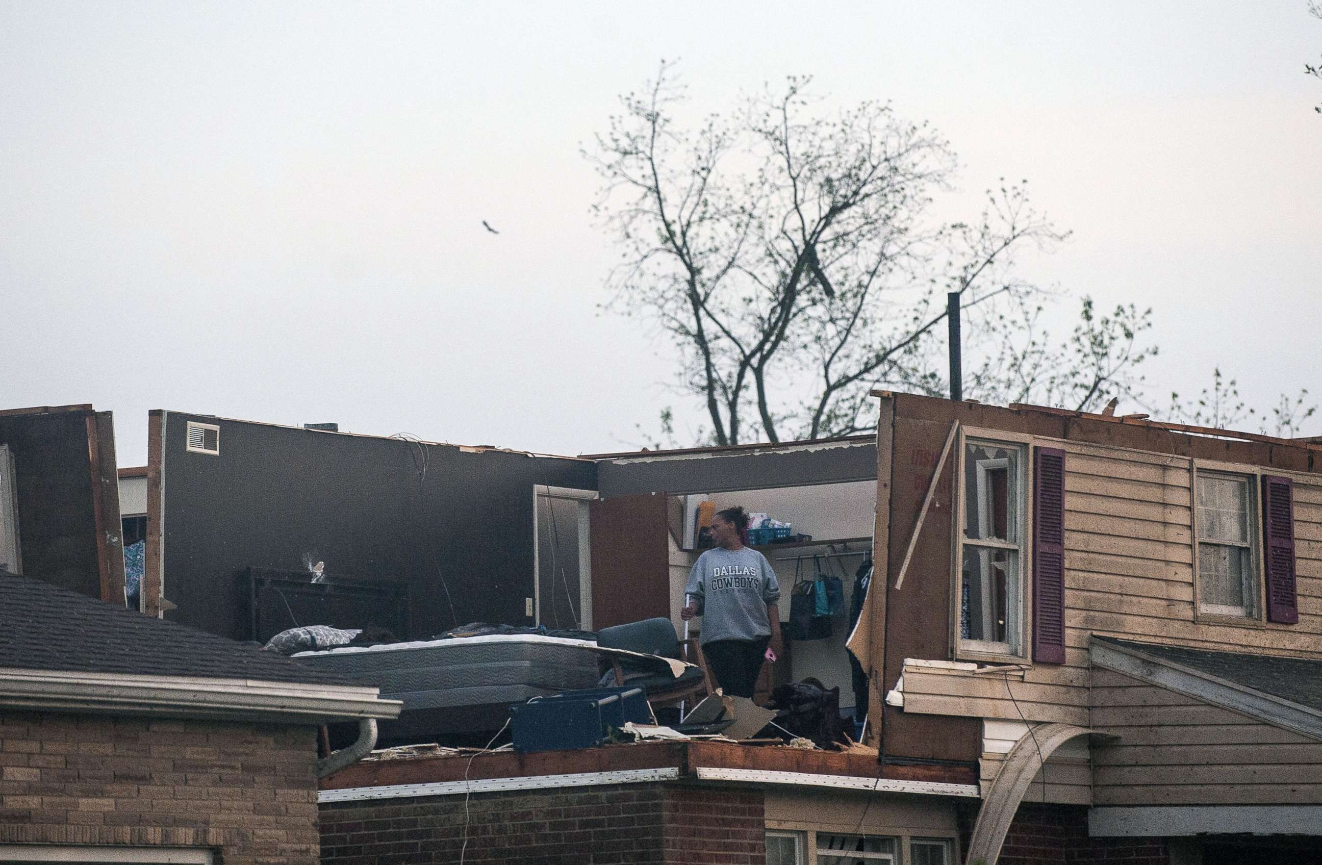 PHOTO: Residents of the Trotwood neighborhood West Brook inspect the damage to their homes following powerful tornado, May 28, 2019, in Trotwood, Ohio.