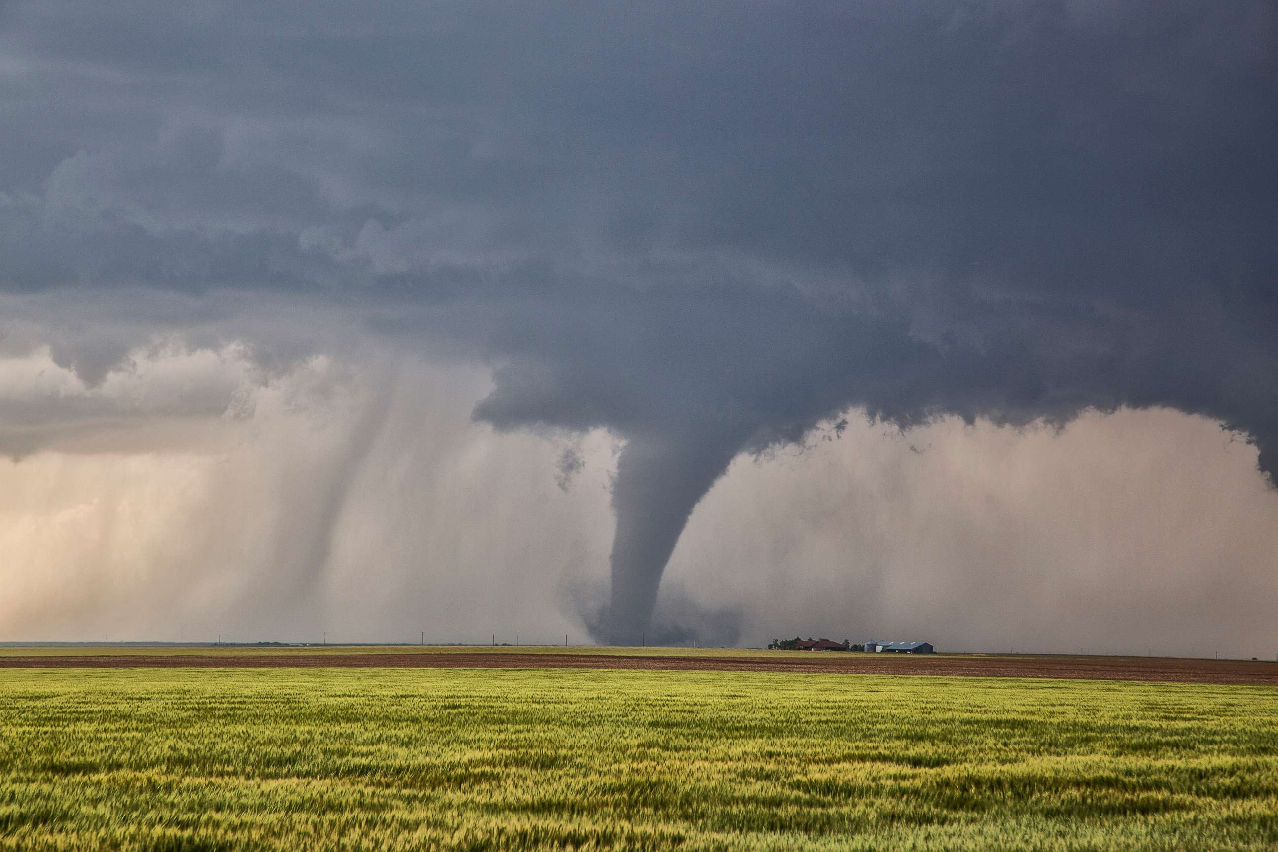 PHOTO: A tornado over a field, taken in Dodge City, Kansas, May 24, 2016.