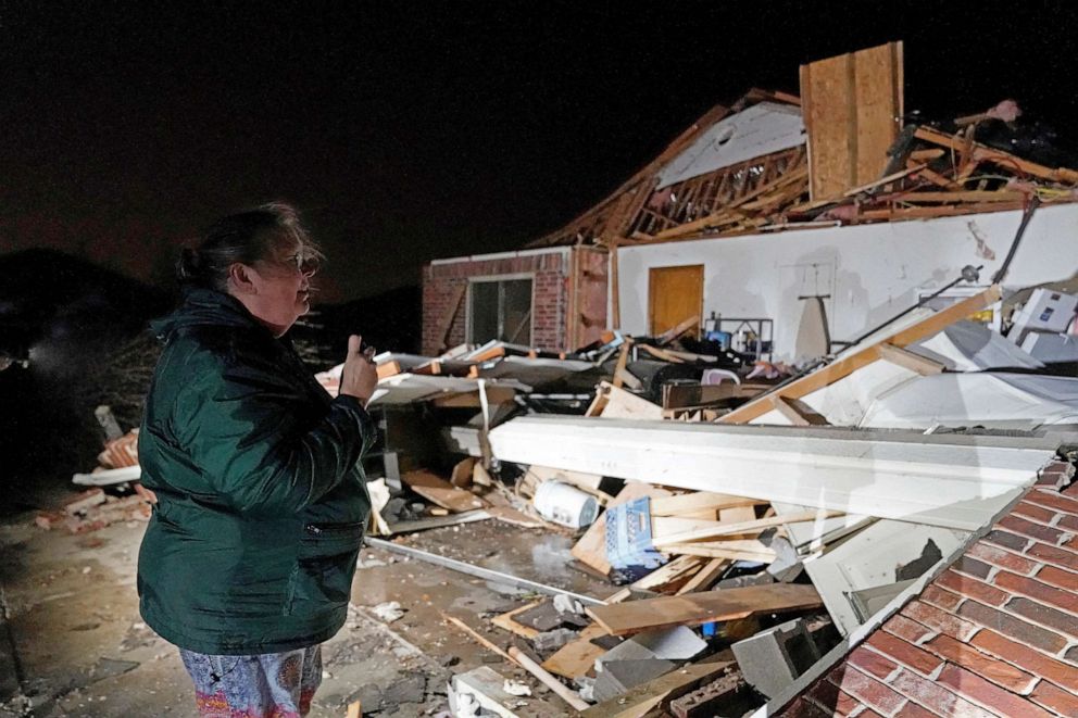 PHOTO: Barbara Buckner looks over her home that was destroyed by a tornado in Norman, Oklahoma, Feb. 27, 2023.