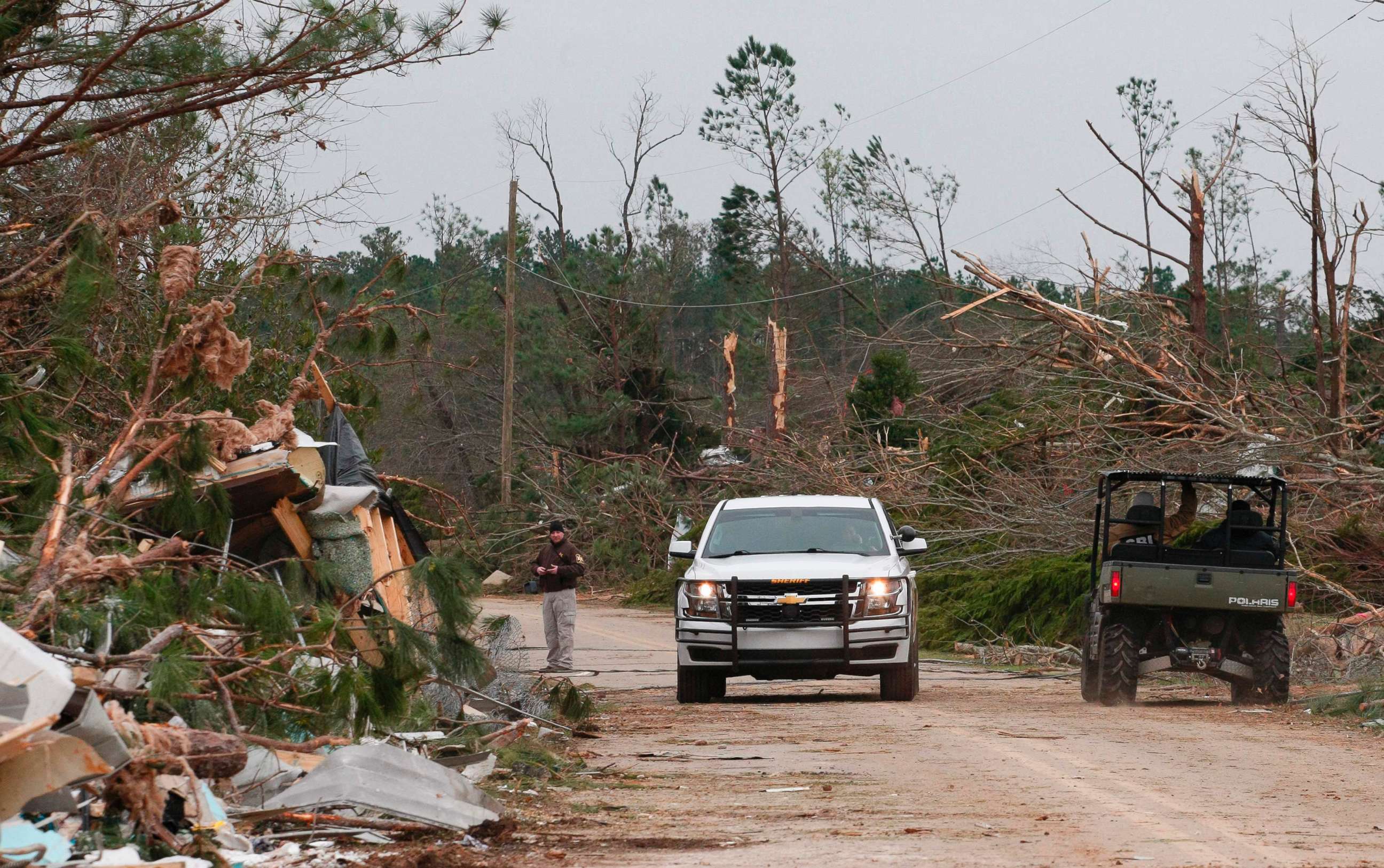 PHOTO: Damage from a tornado is seen as Lee county deputies secure the scene in Beauregard, Ala., March 4, 2019.