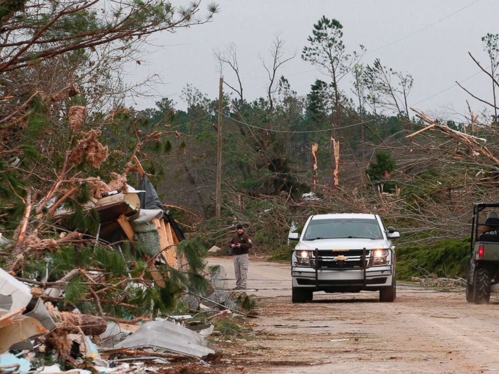 PHOTO: Damage from a tornado is seen as Lee county deputies secure the scene in Beauregard, Ala., March 4, 2019.
