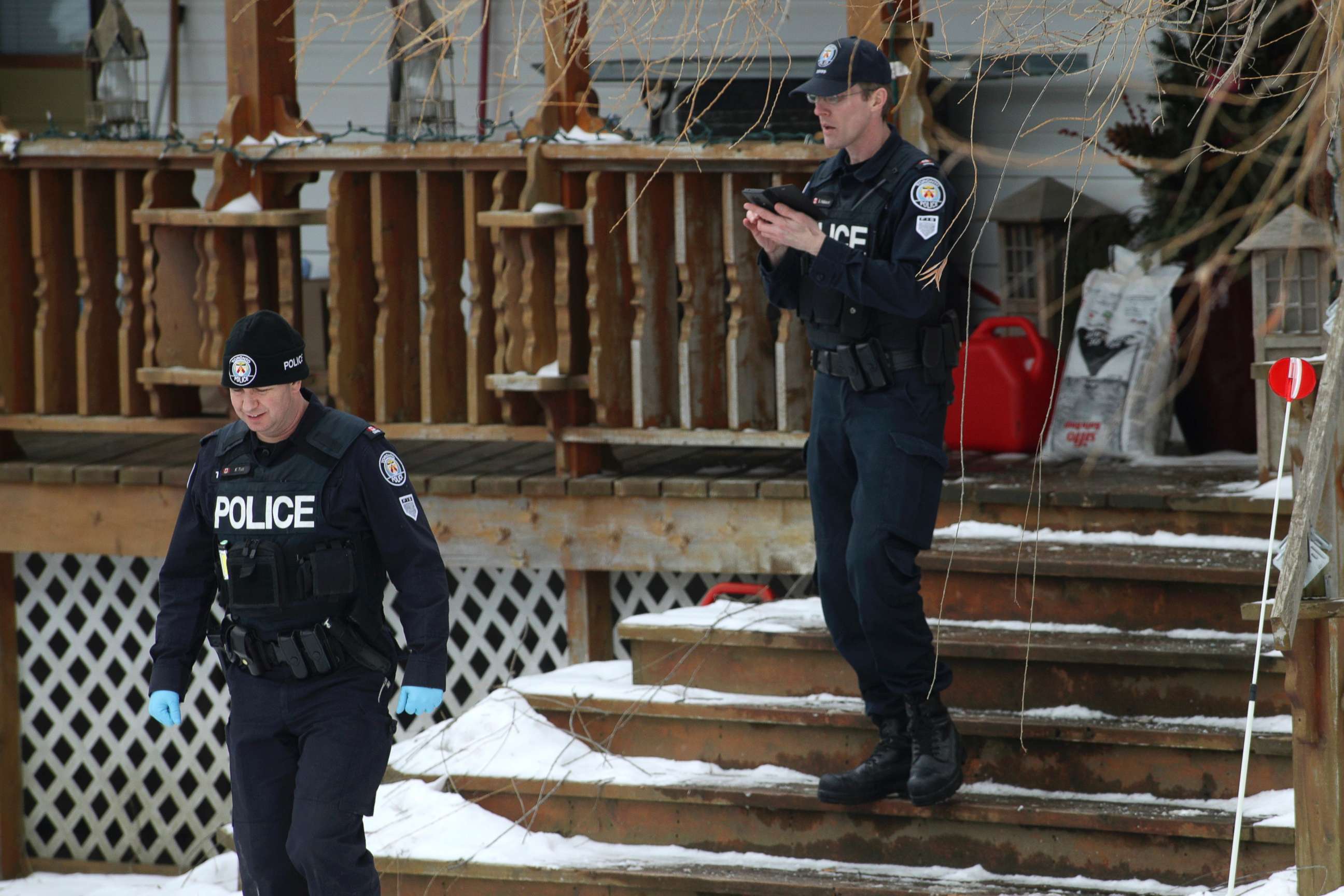 PHOTO: Toronto police forensic officers walk outside a house in Madoc, Ontario in this Jan. 19, 2018 file photo.