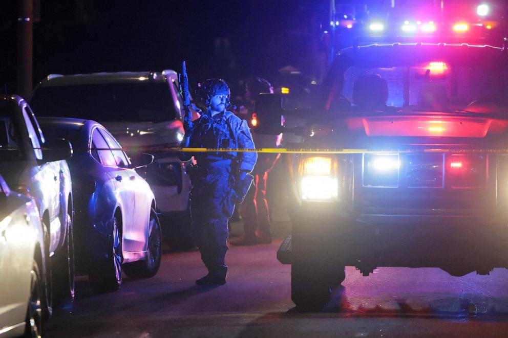 PHOTO: An armed FBI agent stands outside the residence associated with Cole Tomas Allen, the suspect in the shooting incident at the annual White House Correspondents' Association dinner in Washington, D.C., in Torrance, California, U.S., April 25, 2026. 