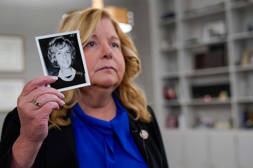 PHOTO: Nassau County District Attorney Anne Donnelly holds a photo of Diane Cusick during an interview with The Associated Press, June 22, 2022, in Mineola, N.Y.