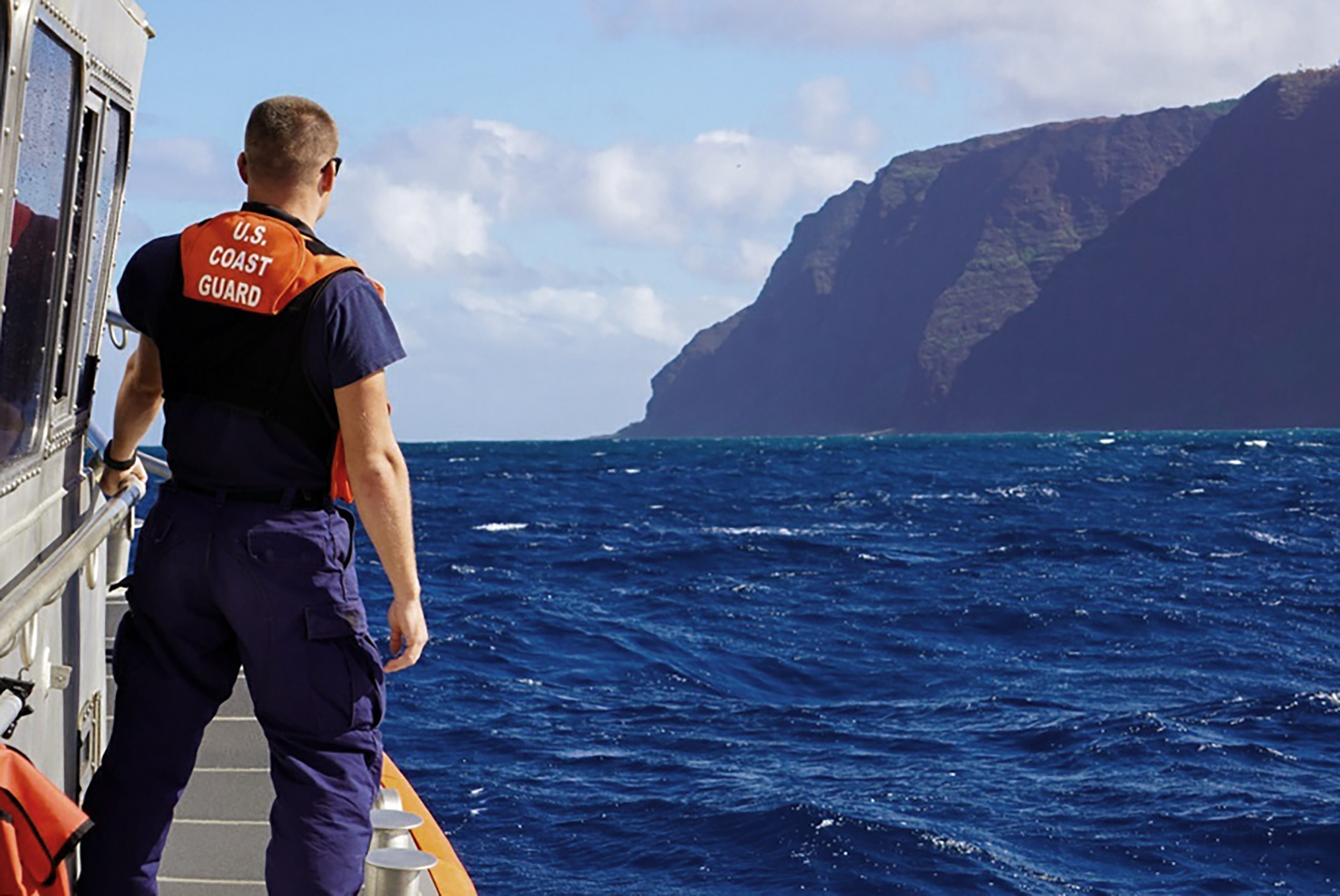 PHOTO: A photo released by the U.S. Coast Guard, Coast Guard Cutter William Hart moves toward the Na Pali Coast on the Hawaiian island of Kauai on Dec. 27, 2019, the day after a tour helicopter disappeared with seven people aboard.