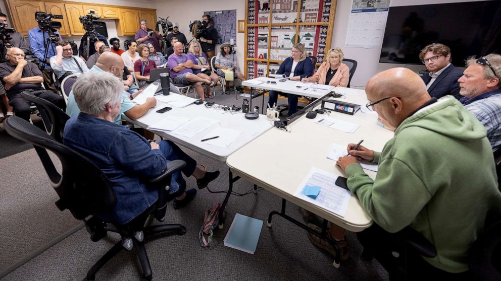 PHOTO: The Goodhue council convenes for a special meeting to address the police department in Goodhue, Minn. The small town will soon be without a police department, an exodus spurred by low pay for the chief and his officers.