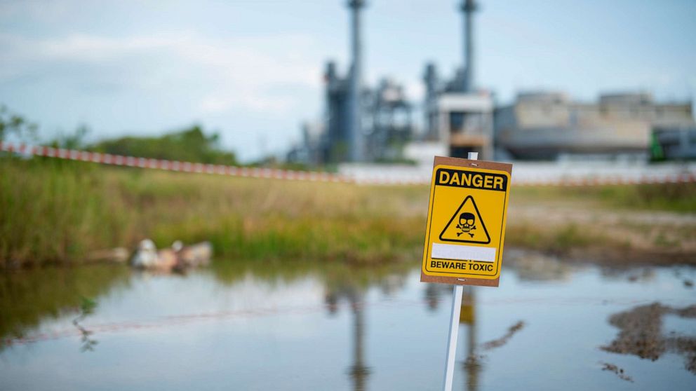 PHOTO: Stock photo of a hazard sign in water.