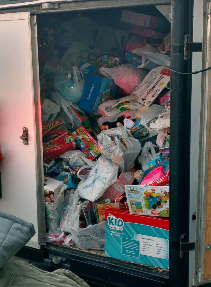 A 14-foot police trailer is stuffed with toys after a donation drive in Hayden, a suburb of Coeur d'Alene, Idaho, Dec. 15, 2018.