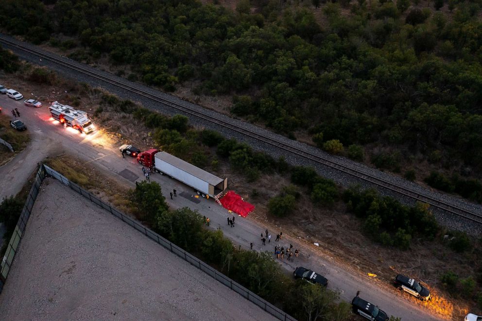 PHOTO: In this June 27, 2022, file photo, members of law enforcement investigate a tractor-trailer in San Antonio, Texas.