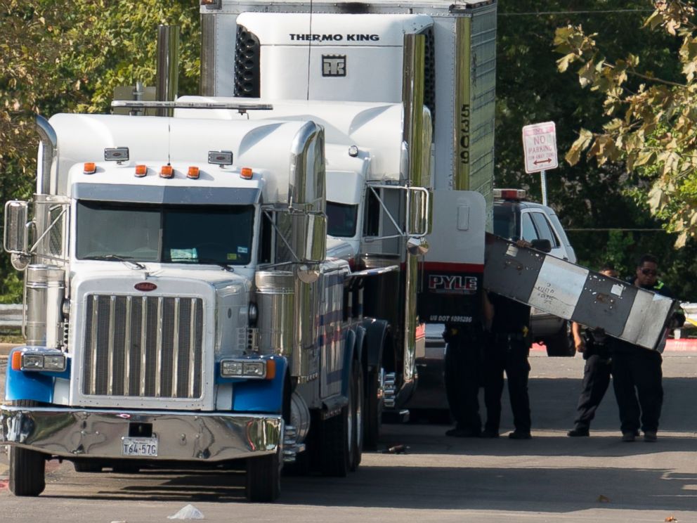PHOTO: Officials tow a truck that was found to contain 38 suspected illegal immigrants in San Antonio, July 23, 2017.