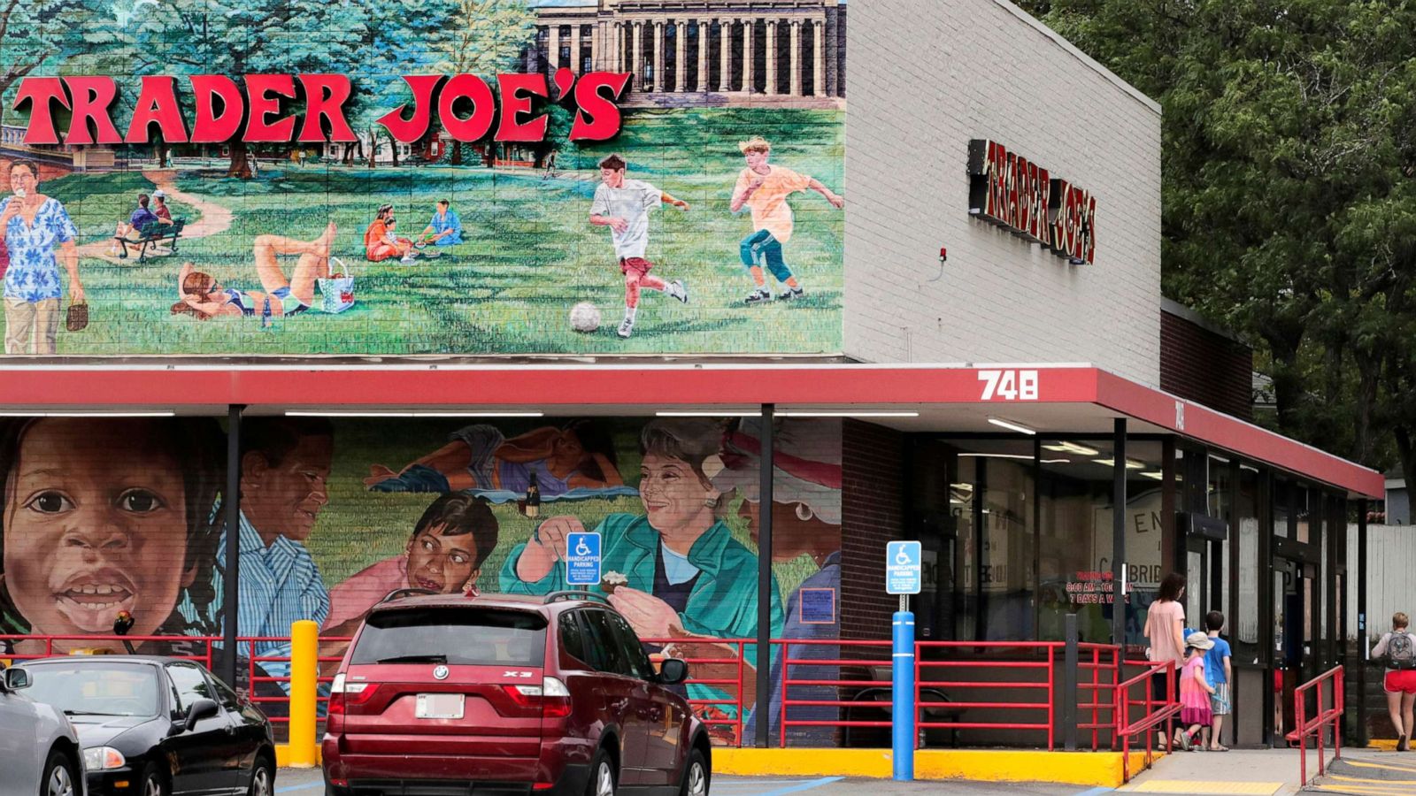 PHOTO: In this Aug. 13, 2019, file photo, customers walk to a Trader Joe's store in Cambridge, Mass.