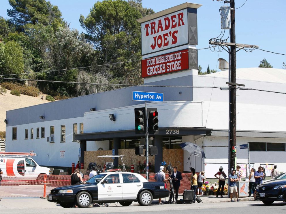 PHOTO: Police officers guard the entrance to the Trader Joes Los Feliz store, as it remains closed for business, July 22, 2018, in Los Angeles.