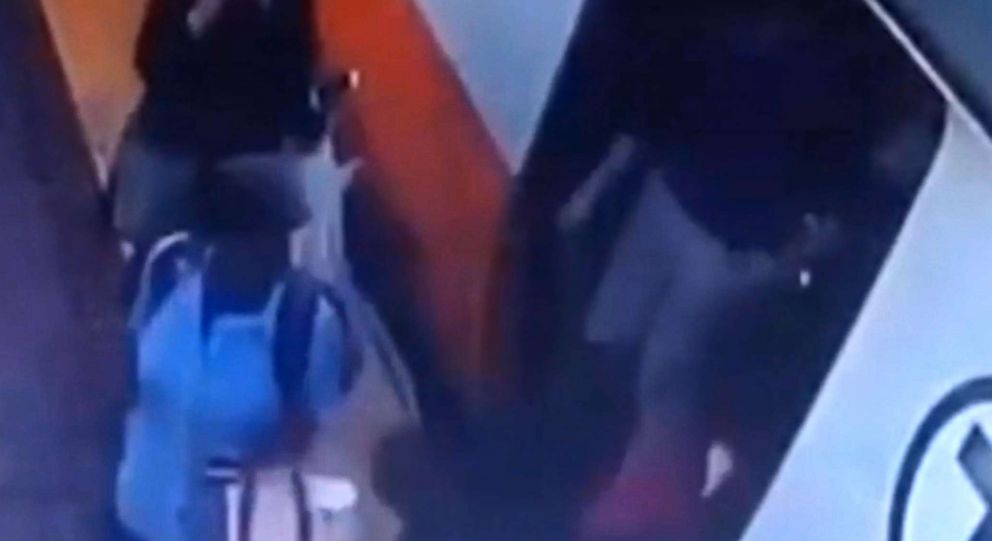 PHOTO: Video shows riders attempting to push the train to free the stranded woman in Boston, June 29, 2018.