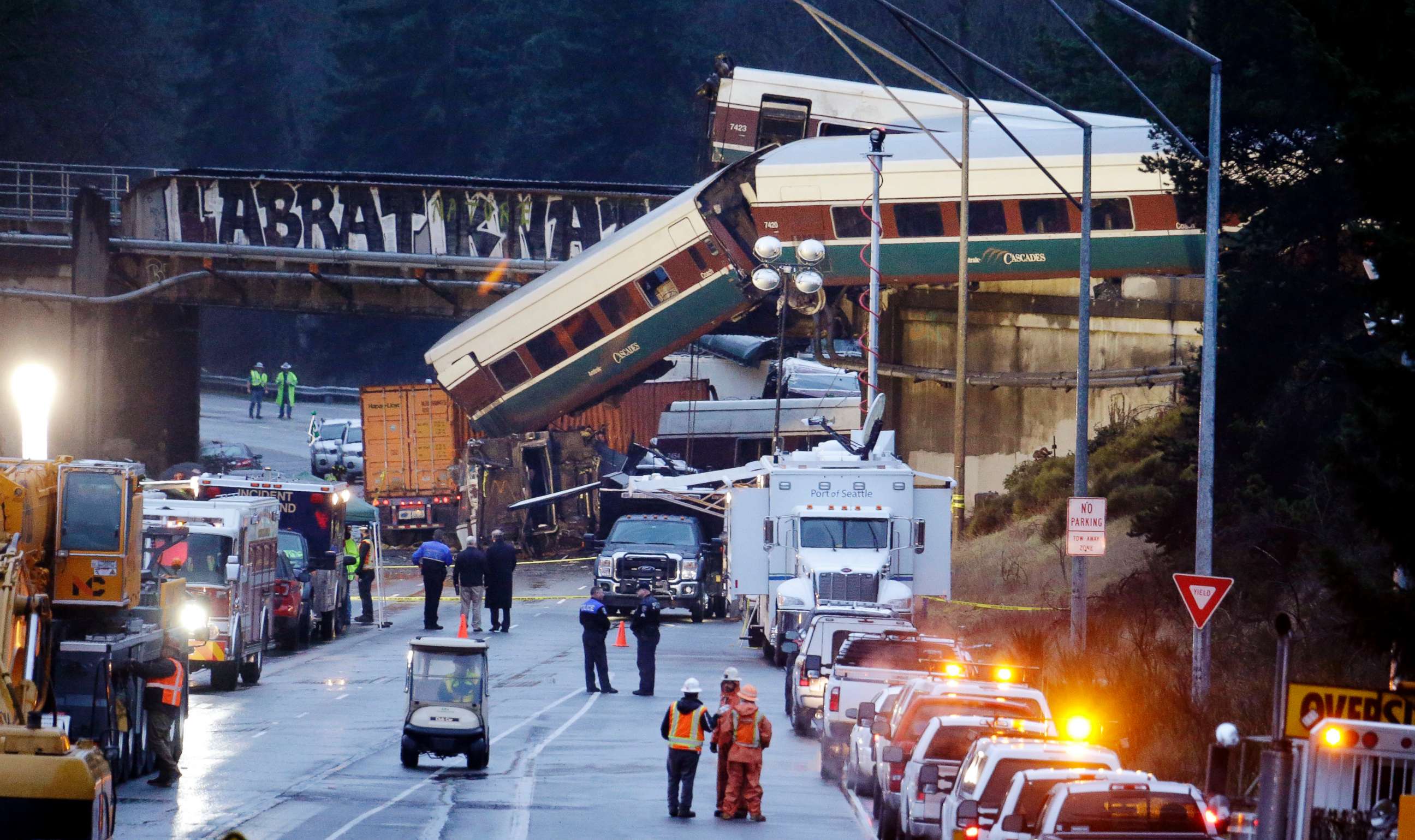 PHOTO: Lights illuminate cars from an Amtrak train that derailed above Interstate 5, Dec. 18, 2017, in DuPont, Wash. 