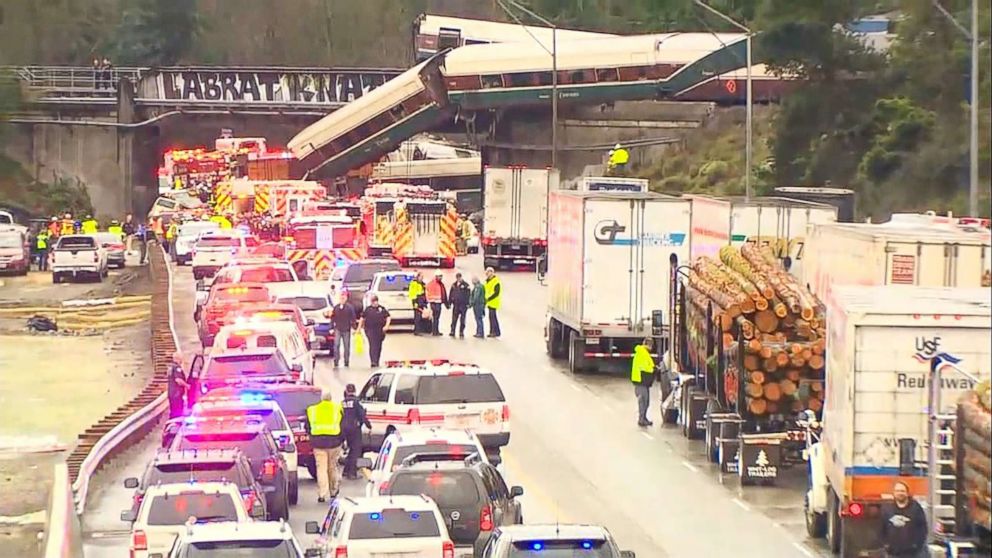 PHOTO: Emergency crews respond to the scene of a train derailment in Washington state, Dec. 18, 2017.