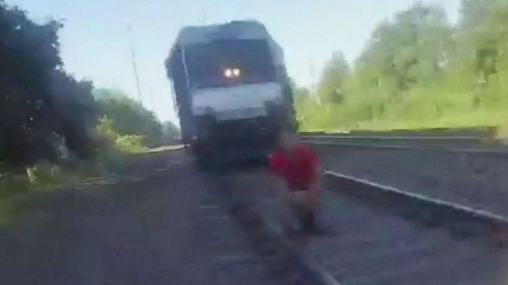 PHOTO: Perth Amboy Police Officer Kyle Savoia's body camera captures footage of his life saving actions, July 19, 2018, as he saved a man who was just moments away from being struck by a moving train.