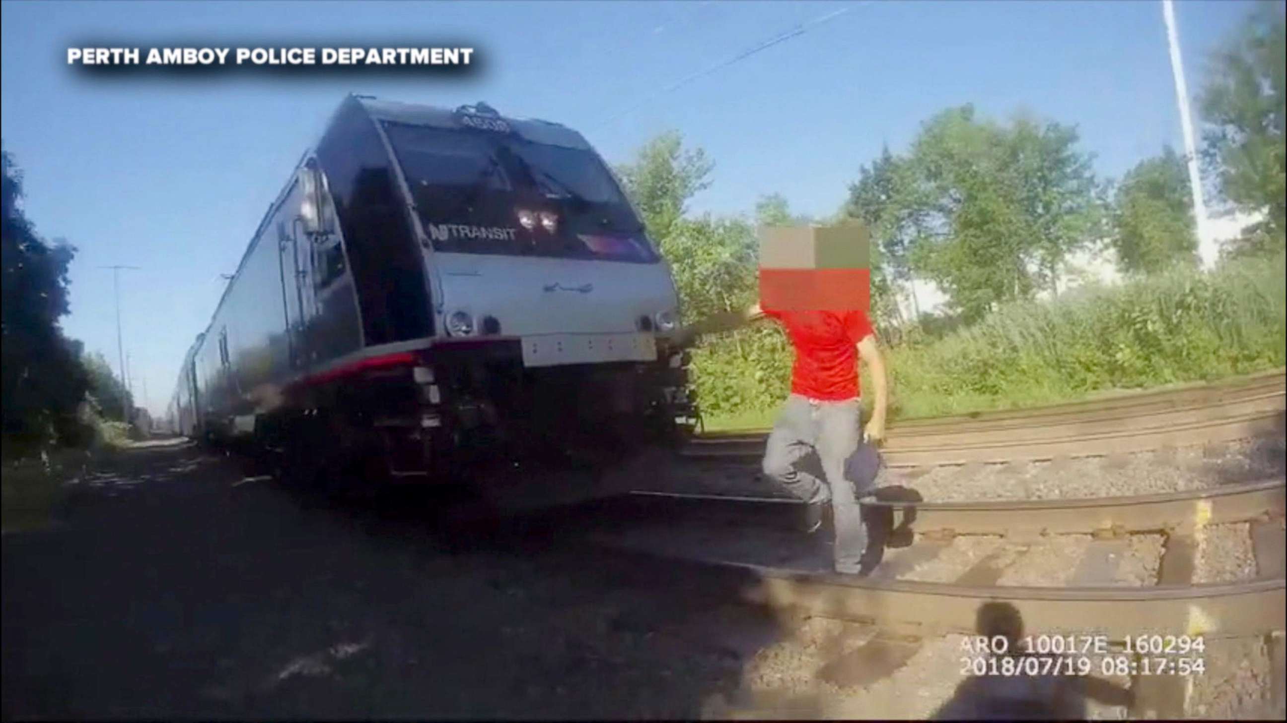 PHOTO: Perth Amboy Police Officer Kyle Savoia's body camera captures footage of his life saving actions, July 19, 2018, as he saved a man who was just moments away from being struck by a moving train.