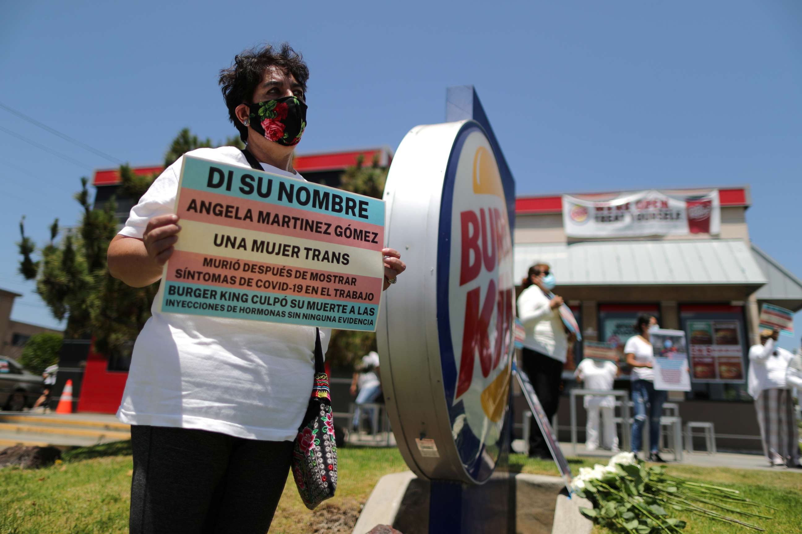 PHOTO: People protest to demand increased safety measures from Burger King after employees said a fellow worker died amid the outbreak of the coronavirus, in Los Angeles, July 10, 2020.